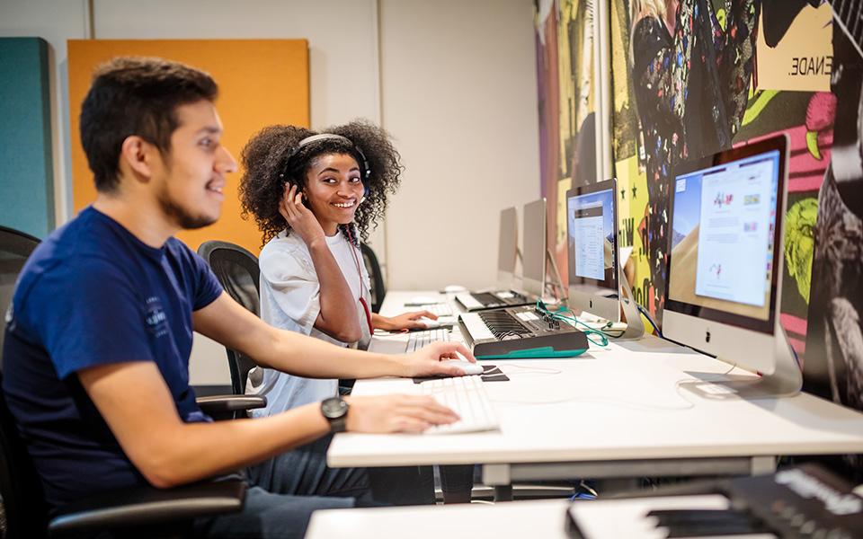 Online Learning Students at desk workspace